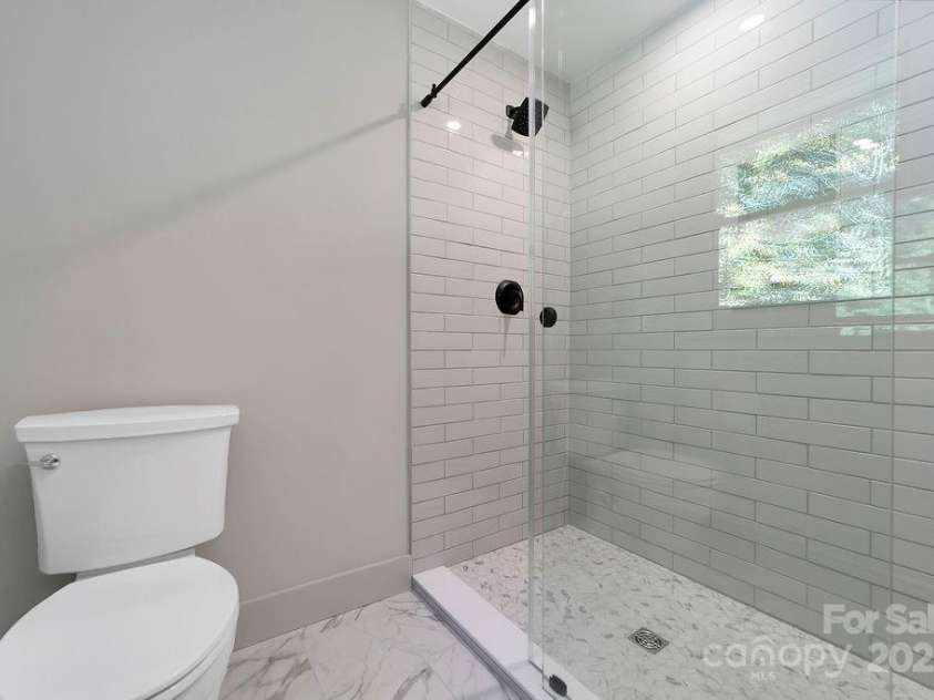 7321 Greenville Highway, Brevard, NC 28712.  MLS# CAR4302860, YatesRealty ID 3738. Custom Tile