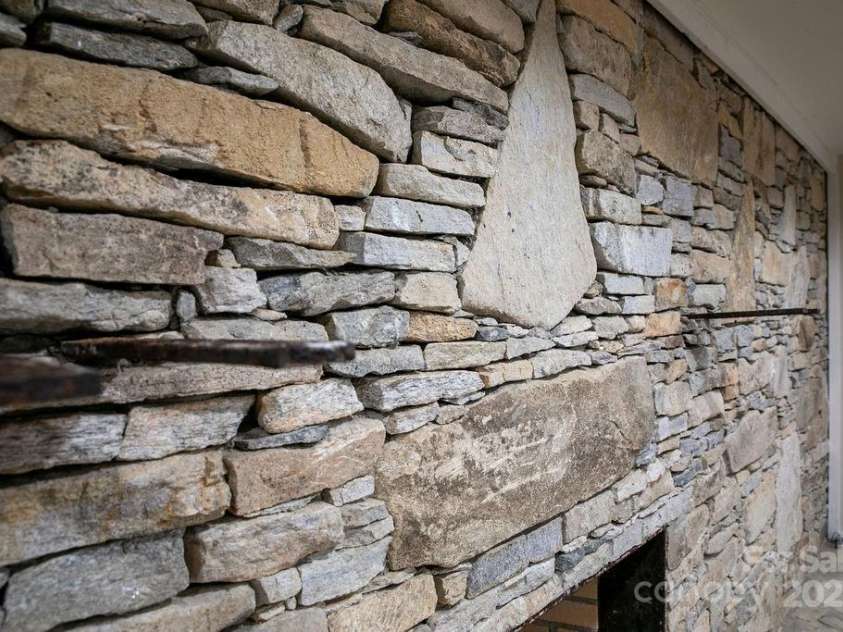 7321 Greenville Highway, Brevard, NC 28712.  MLS# CAR4302860, YatesRealty ID 3738. Gorgeous Rockwork