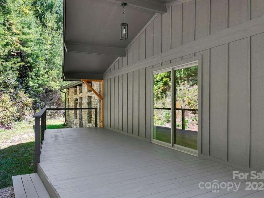 7321 Greenville Highway, Brevard, NC 28712.  MLS# CAR4302860, YatesRealty ID 3738. Rear Covered Deck/Very Private
