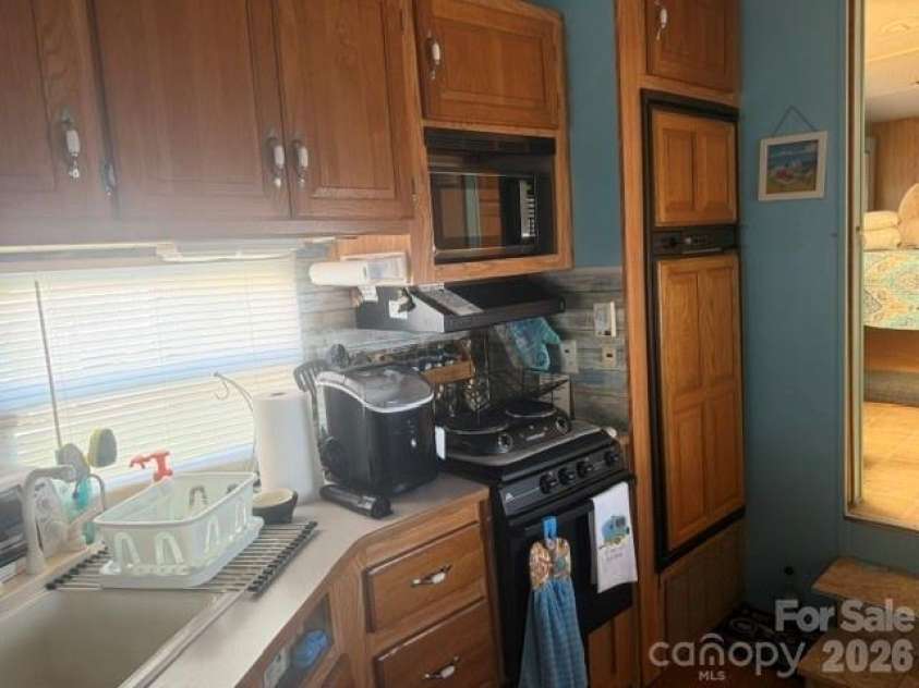 145 Grand View Drive, New London, NC 28127.  MLS# CAR4363003, YatesRealty ID 37382. 