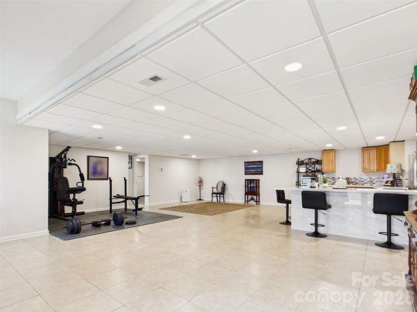 117 Summersong Lane, Mooresville, NC 28117.  MLS# CAR4383546, YatesRealty ID 37394. Covered lower area