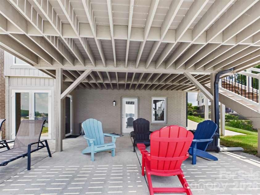 117 Summersong Lane, Mooresville, NC 28117.  MLS# CAR4383546, YatesRealty ID 37394. Covered lower area