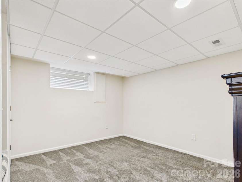 117 Summersong Lane, Mooresville, NC 28117.  MLS# CAR4383546, YatesRealty ID 37394. Extra space/office on lower level