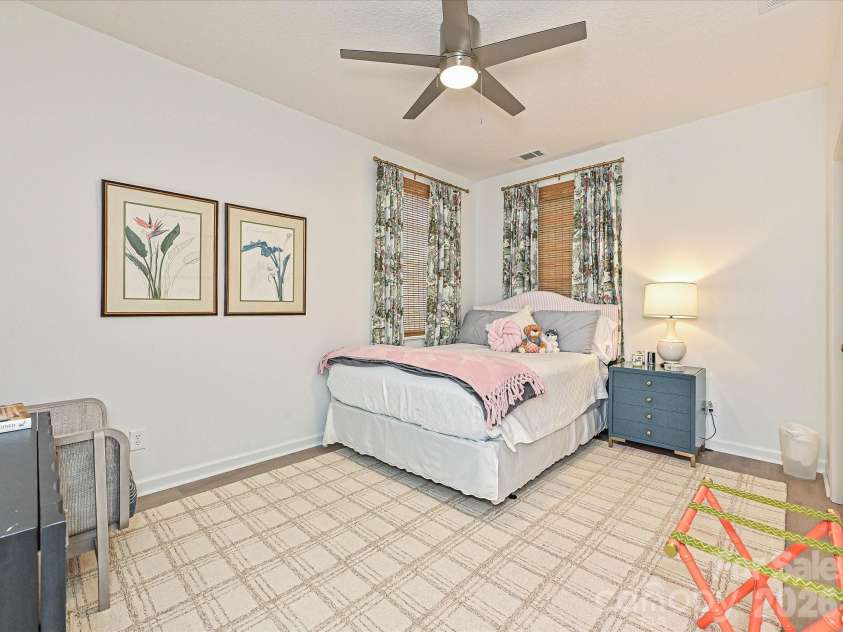 3520 Bank Court, Matthews, NC 28105.  MLS# CAR4403916, YatesRealty ID 37396. Main Floor Bedroom