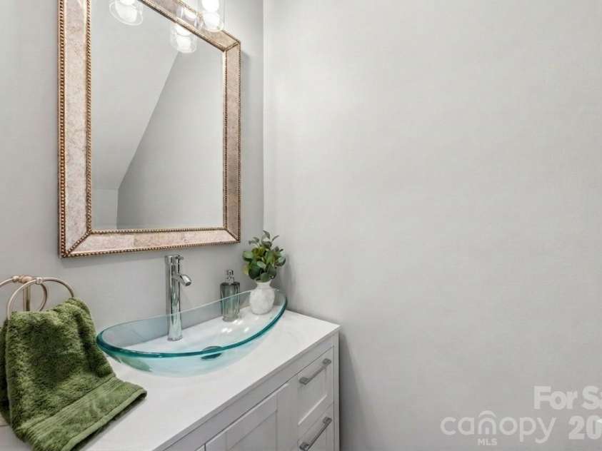 143 Arcadian Way, Mooresville, NC 28117.  MLS# CAR4384675, YatesRealty ID 37401. Remodeled half bath just off the kitchen.
