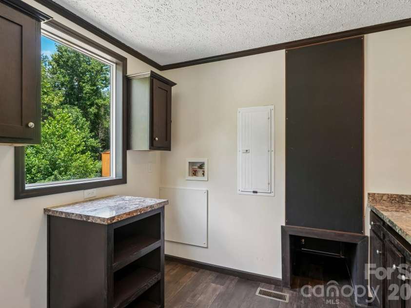 5531 Dalmation Street, Iron Station, NC 28080.  MLS# CAR4402913, YatesRealty ID 37413. Laundry