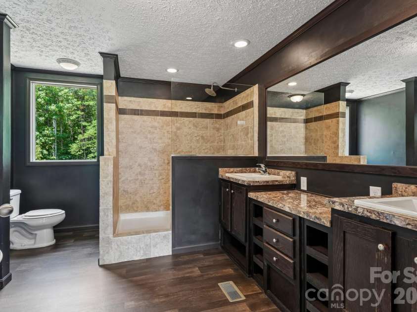 5531 Dalmation Street, Iron Station, NC 28080.  MLS# CAR4402913, YatesRealty ID 37413. Primary Bathroom