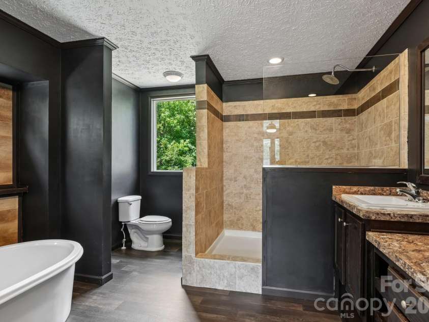 5531 Dalmation Street, Iron Station, NC 28080.  MLS# CAR4402913, YatesRealty ID 37413. Primary Bathroom