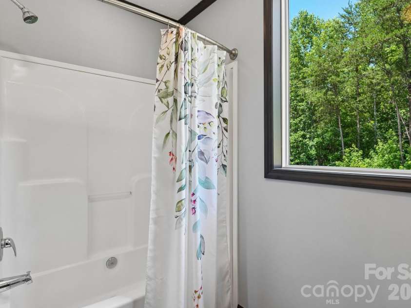5531 Dalmation Street, Iron Station, NC 28080.  MLS# CAR4402913, YatesRealty ID 37413. Secondary bathroom