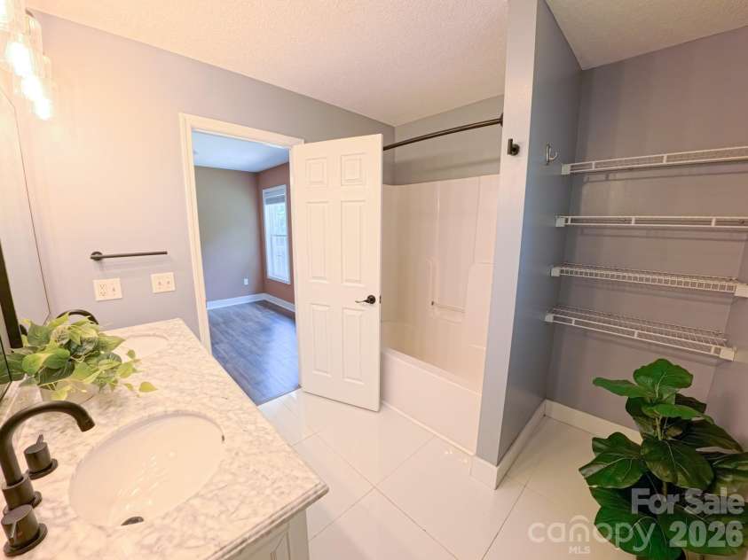 101 Tail Feather Lane, Candler, NC 28715.  MLS# CAR4398430, YatesRealty ID 37414. Primary Bathroom