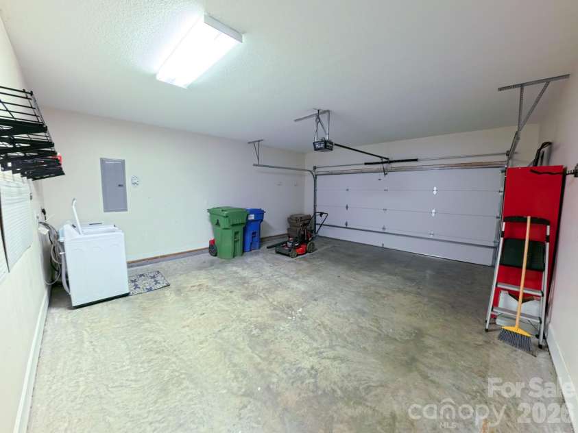101 Tail Feather Lane, Candler, NC 28715.  MLS# CAR4398430, YatesRealty ID 37414. Spacious Garage and laundry area