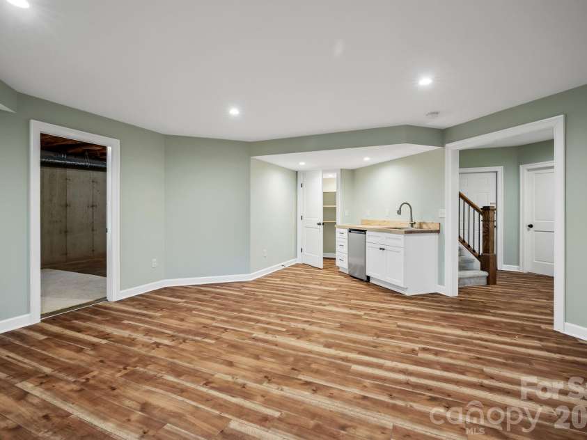 105 Welwyn Lane, Asheville, NC 28805.  MLS# CAR4401129, YatesRealty ID 37418. Lower Level Kitchenette