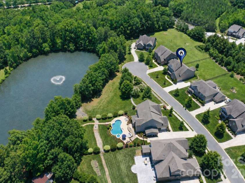 2028 Perry Pond Drive, Waxhaw, NC 28173.  MLS# CAR4383603, YatesRealty ID 37422. Pond water is enhanced