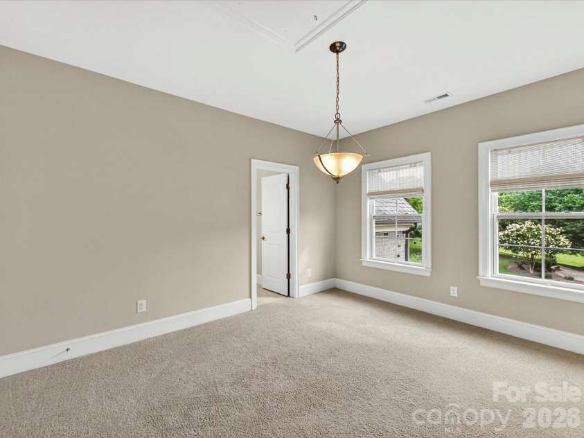 2028 Perry Pond Drive, Waxhaw, NC 28173.  MLS# CAR4383603, YatesRealty ID 37422. Upper level Bedroom #3 with ensuite bath