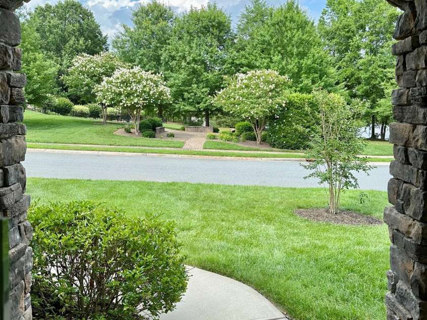 2028 Perry Pond Drive, Waxhaw, NC 28173.  MLS# CAR4383603, YatesRealty ID 37422. View from front door looking towards the pond