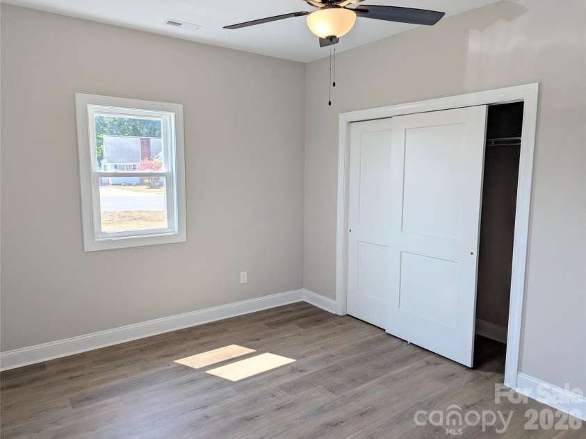 258 East Avenue, Monroe, NC 28110.  MLS# CAR4398935, YatesRealty ID 37423. Bedroom 2 - Front Side