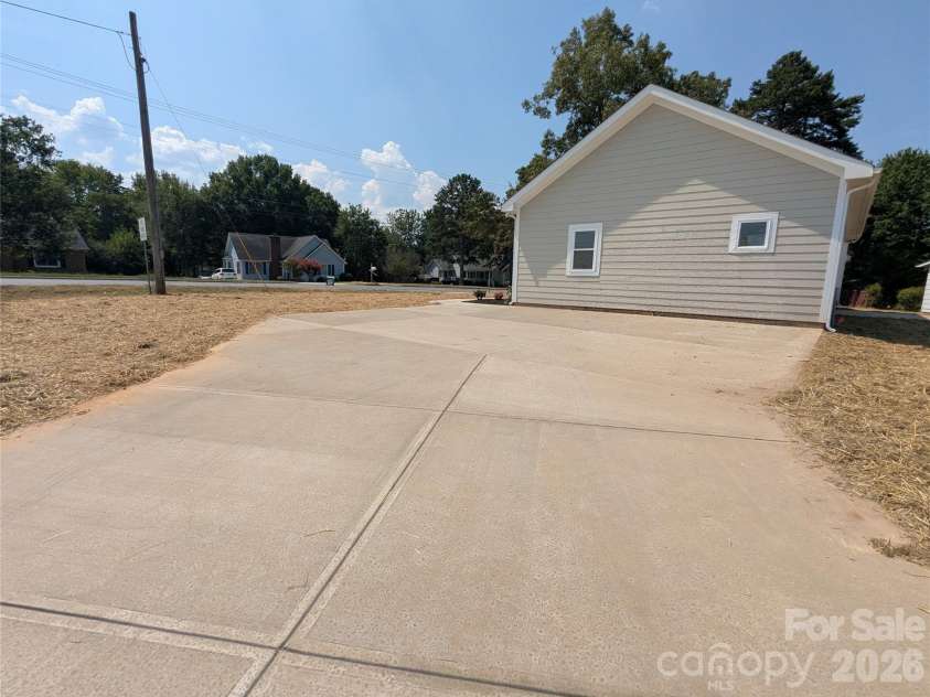 258 East Avenue, Monroe, NC 28110.  MLS# CAR4398935, YatesRealty ID 37423. Huge Driveway, plenty of parking
