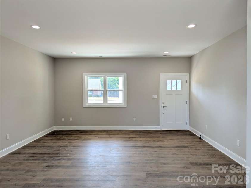 258 East Avenue, Monroe, NC 28110.  MLS# CAR4398935, YatesRealty ID 37423. Huge Living Room