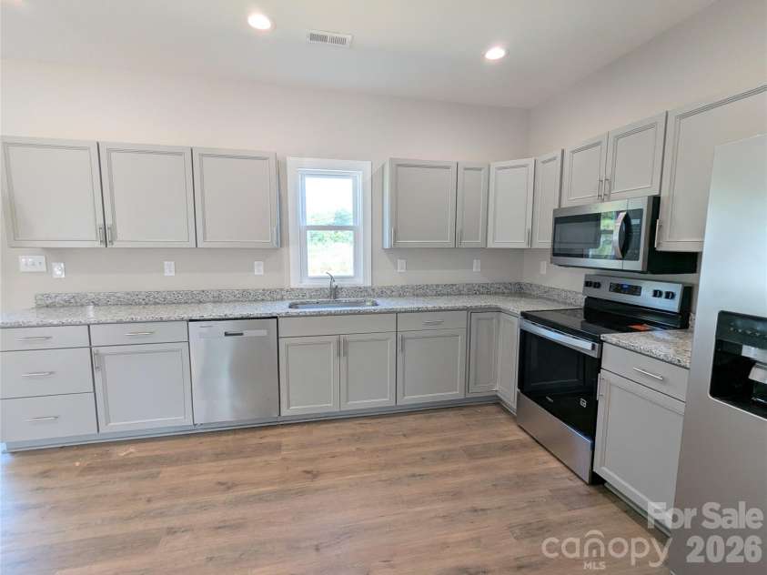 258 East Avenue, Monroe, NC 28110.  MLS# CAR4398935, YatesRealty ID 37423. Spacious Kitchen