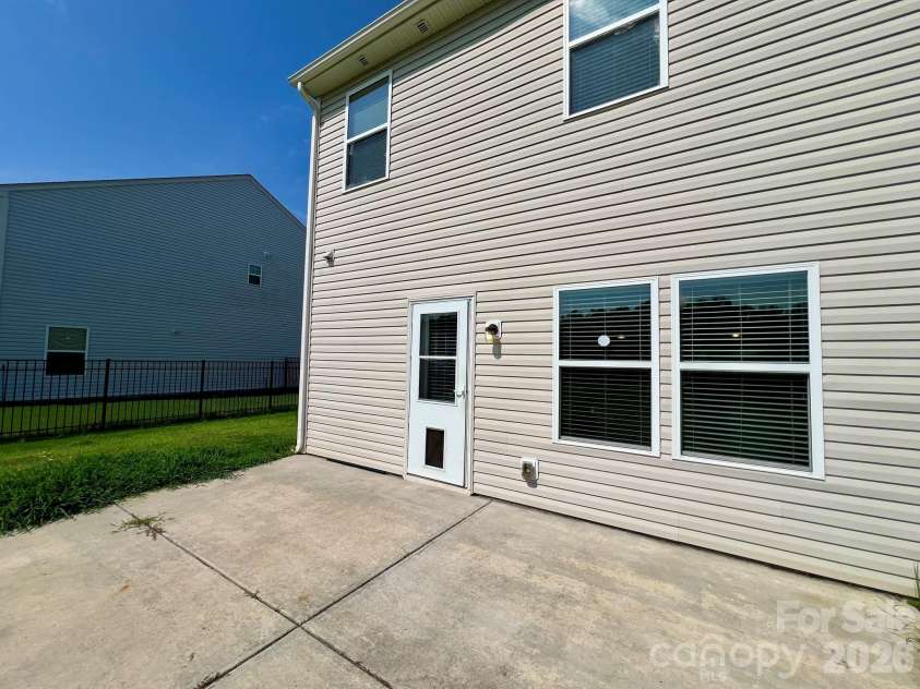 2007 Creeks Landing Drive, Monroe, NC 28110.  MLS# CAR4395896, YatesRealty ID 37424. Back Patio