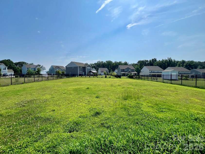 2007 Creeks Landing Drive, Monroe, NC 28110.  MLS# CAR4395896, YatesRealty ID 37424. Large FENCED YARD!