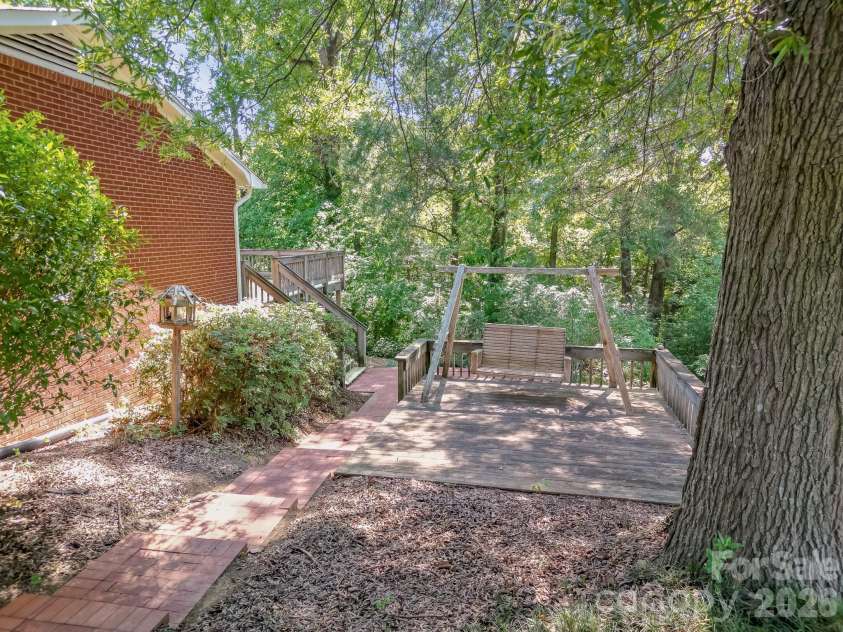2520 Austin Chaney Road, Wingate, NC 28174.  MLS# CAR4400430, YatesRealty ID 37425. Swing with Brick Path to Patio