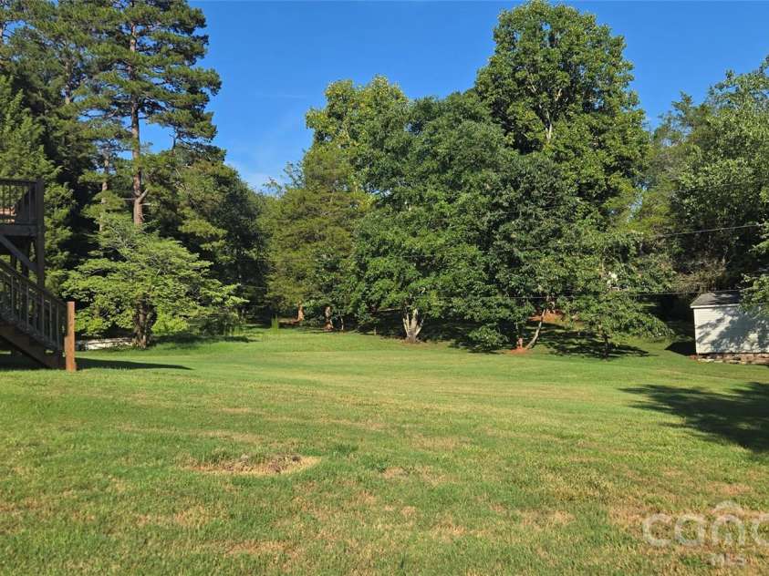 131 Morvue Loop, Statesville, NC 28625.  MLS# CAR4375122, YatesRealty ID 37436. Back yard