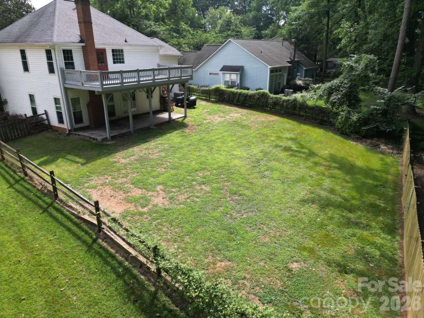 8615 Harmony Bridge Place, Charlotte, NC 28216.  MLS# CAR4381839, YatesRealty ID 37437. Back Ariel view