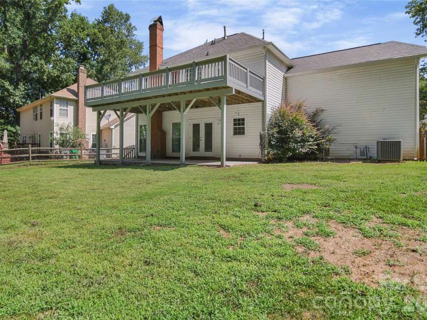 8615 Harmony Bridge Place, Charlotte, NC 28216.  MLS# CAR4381839, YatesRealty ID 37437. Backyard