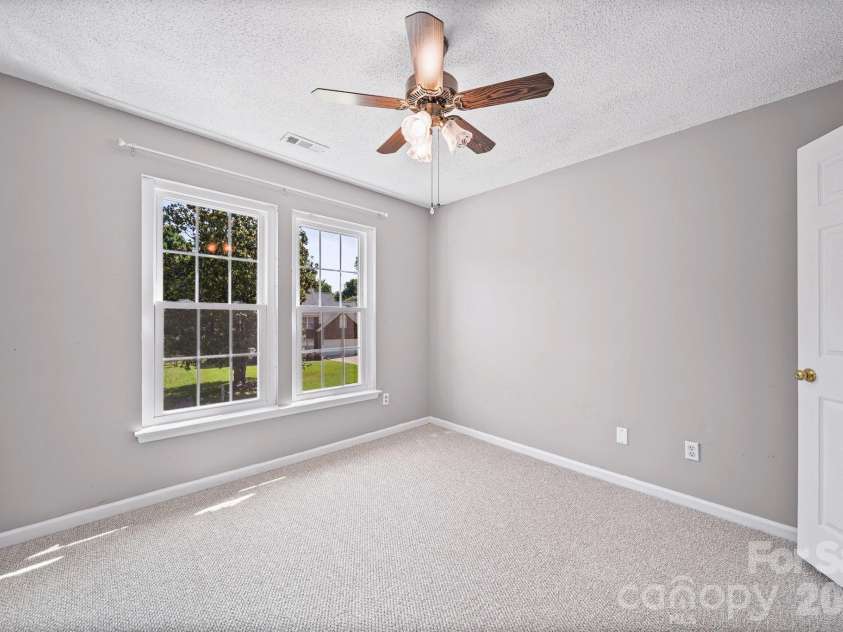 8615 Harmony Bridge Place, Charlotte, NC 28216.  MLS# CAR4381839, YatesRealty ID 37437. Bedroom 3