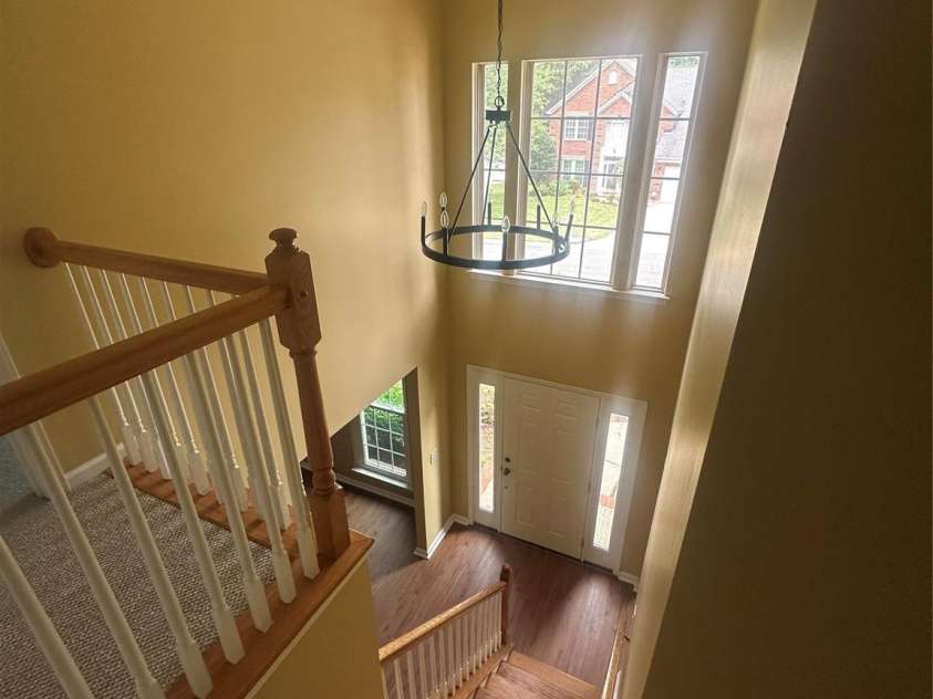 8615 Harmony Bridge Place, Charlotte, NC 28216.  MLS# CAR4381839, YatesRealty ID 37437. Foyer from second level