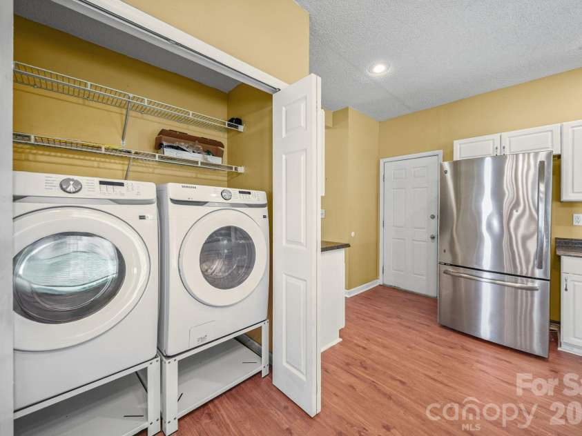 8615 Harmony Bridge Place, Charlotte, NC 28216.  MLS# CAR4381839, YatesRealty ID 37437. Laundry