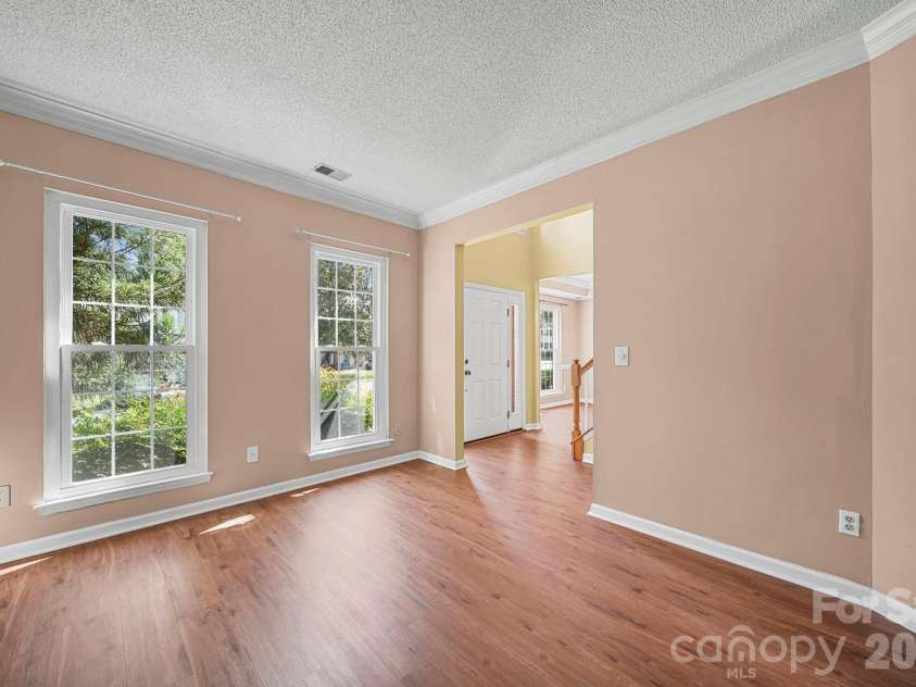 8615 Harmony Bridge Place, Charlotte, NC 28216.  MLS# CAR4381839, YatesRealty ID 37437. Living Room