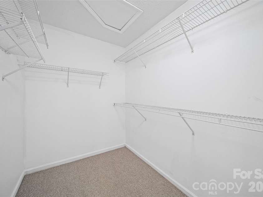 8615 Harmony Bridge Place, Charlotte, NC 28216.  MLS# CAR4381839, YatesRealty ID 37437. Primary Walk-in closet