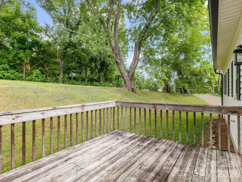 47 Carolina Mountain Drive, Candler, NC 28715.  MLS# CAR4403148, YatesRealty ID 37439. Back deck