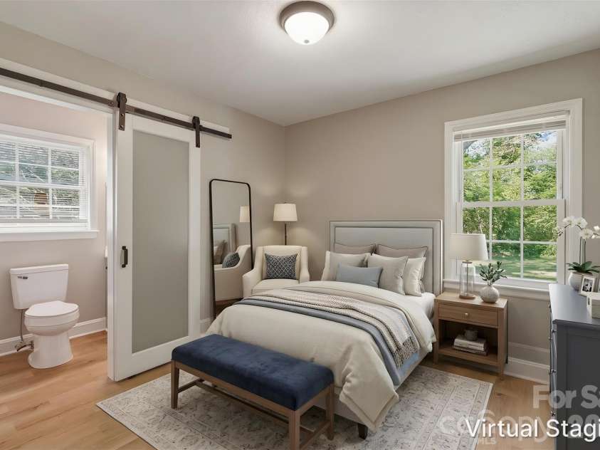 4706 Brooktree Drive, Charlotte, NC 28208.  MLS# CAR4404822, YatesRealty ID 37440. Walking into the primary bedroom. Major highlight is the ensuite full bath (virtually staged & enhanced).