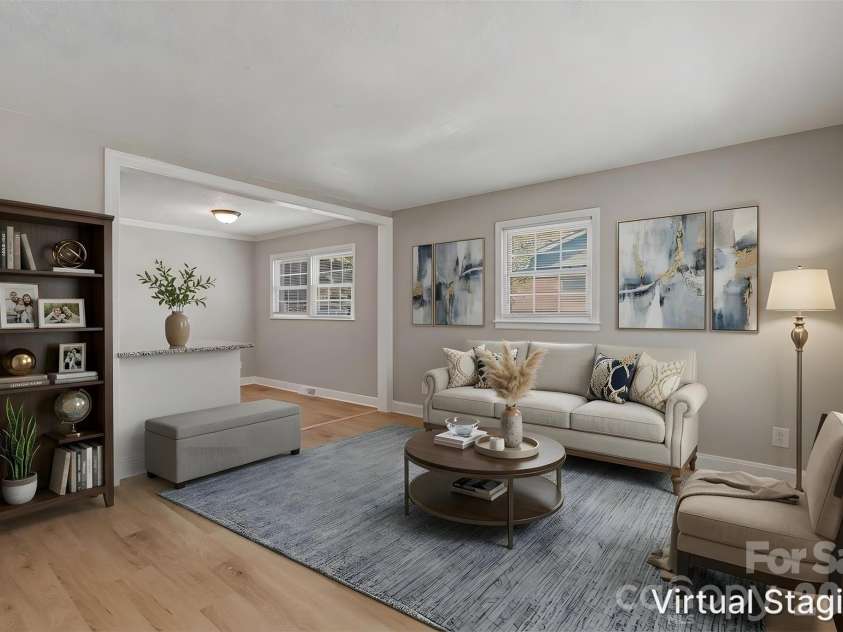 4706 Brooktree Drive, Charlotte, NC 28208.  MLS# CAR4404822, YatesRealty ID 37440. Walking through the front door into the living room (virtually staged & enhanced).