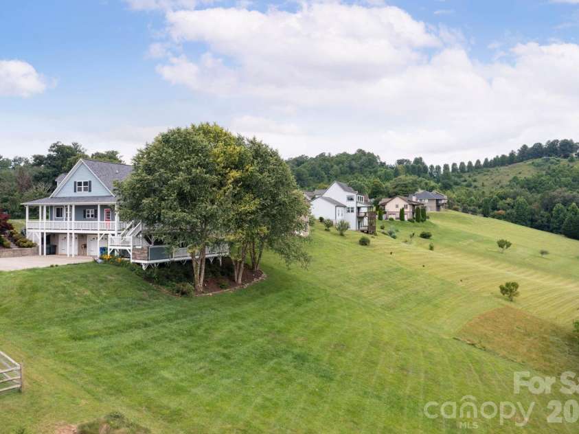 93 Big Sky Drive, Leicester, NC 28748.  MLS# CAR4403278, YatesRealty ID 37449. HUGE Yard