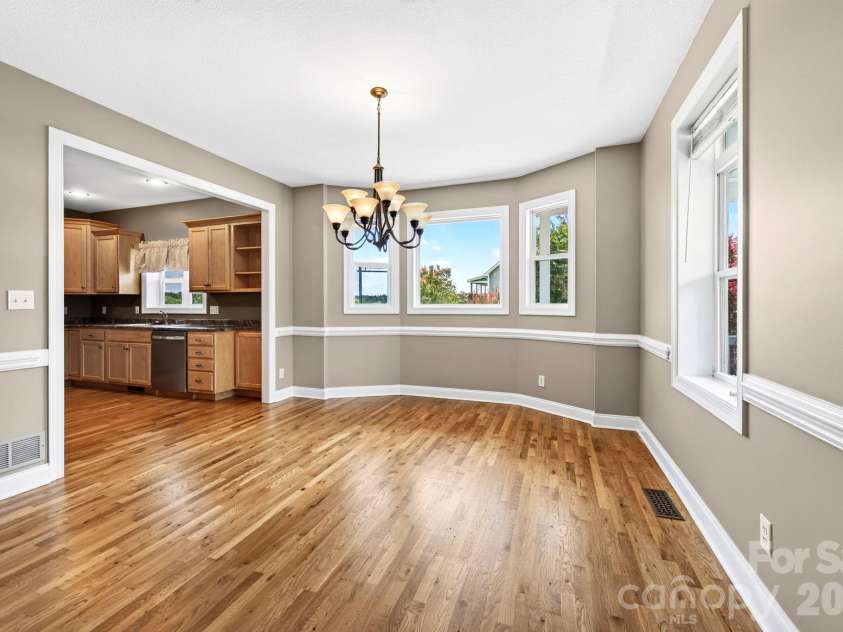 93 Big Sky Drive, Leicester, NC 28748.  MLS# CAR4403278, YatesRealty ID 37449. Open to the Kitchen