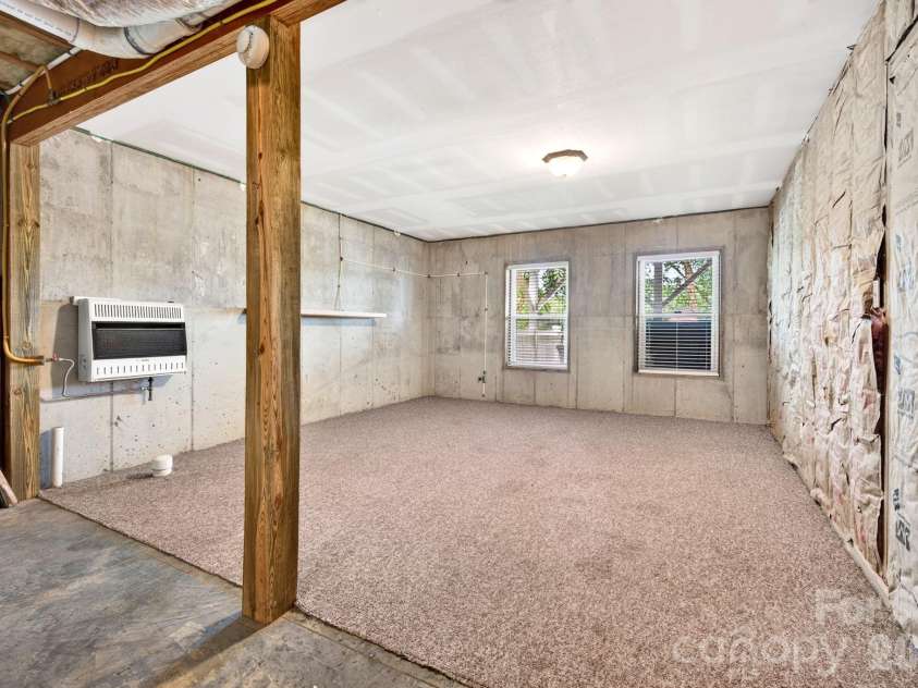 93 Big Sky Drive, Leicester, NC 28748.  MLS# CAR4403278, YatesRealty ID 37449. Potential to finish this space