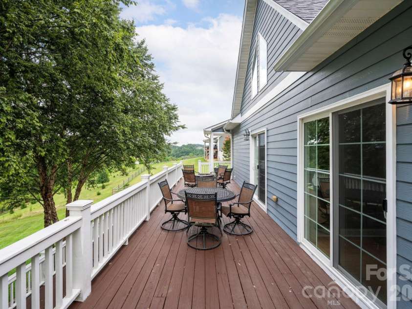 93 Big Sky Drive, Leicester, NC 28748.  MLS# CAR4403278, YatesRealty ID 37449. Sliding doors from living room