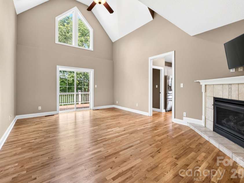 93 Big Sky Drive, Leicester, NC 28748.  MLS# CAR4403278, YatesRealty ID 37449. Sliding doors leads to deck