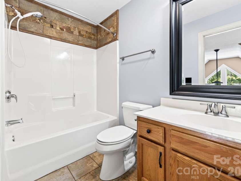 93 Big Sky Drive, Leicester, NC 28748.  MLS# CAR4403278, YatesRealty ID 37449. Upstairs Bathroom