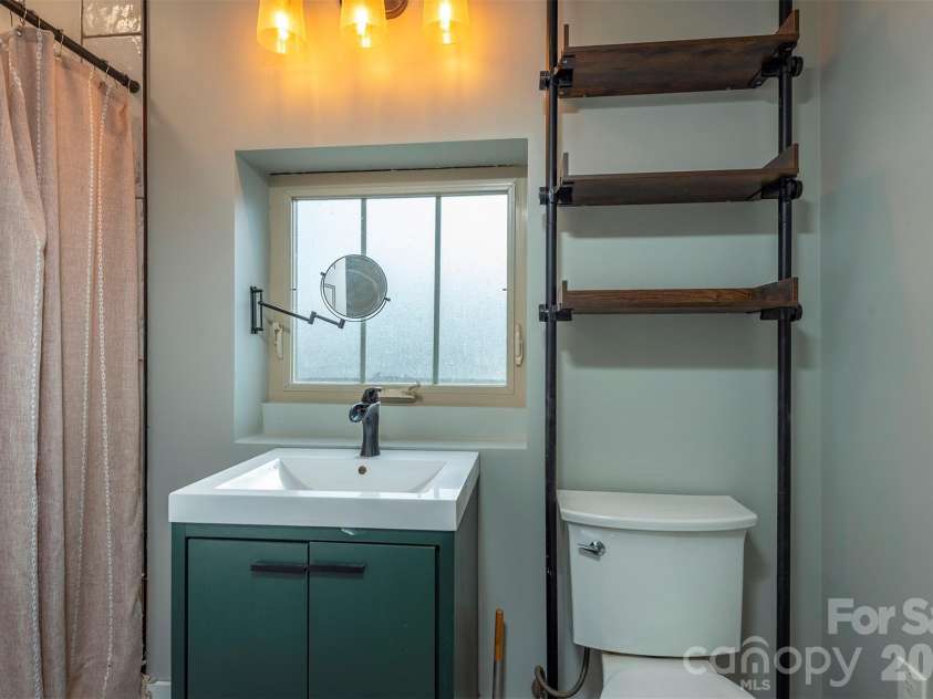 115 Bartram Way, Black Mountain, NC 28711.  MLS# CAR4334458, YatesRealty ID 3745. Lower Level Bathroom
