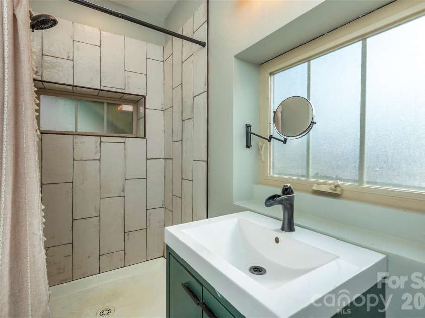 115 Bartram Way, Black Mountain, NC 28711.  MLS# CAR4334458, YatesRealty ID 3745. Lower Level Bathroom