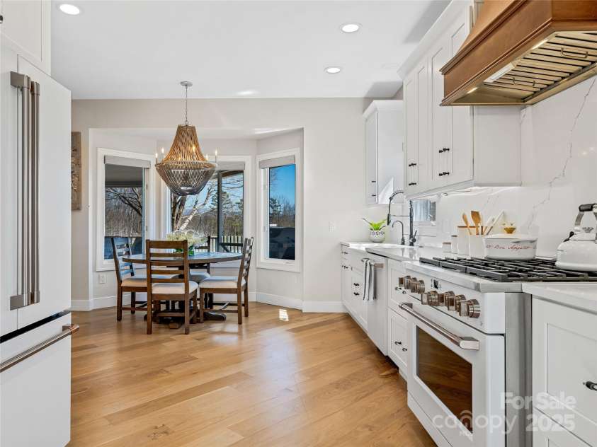 55 Plantation Drive, Asheville, NC 28806.  MLS# CAR4230730, YatesRealty ID 3745. Kitchen View #3 with Breakfast nook. Completely remodeled!