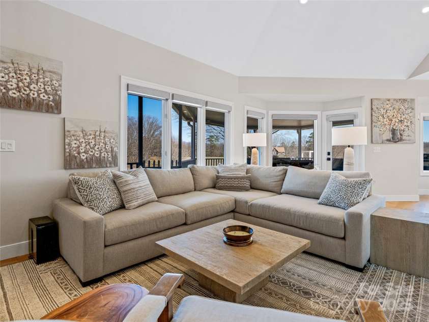 55 Plantation Drive, Asheville, NC 28806.  MLS# CAR4230730, YatesRealty ID 3745. Living Room View towards covered outdoor living space.