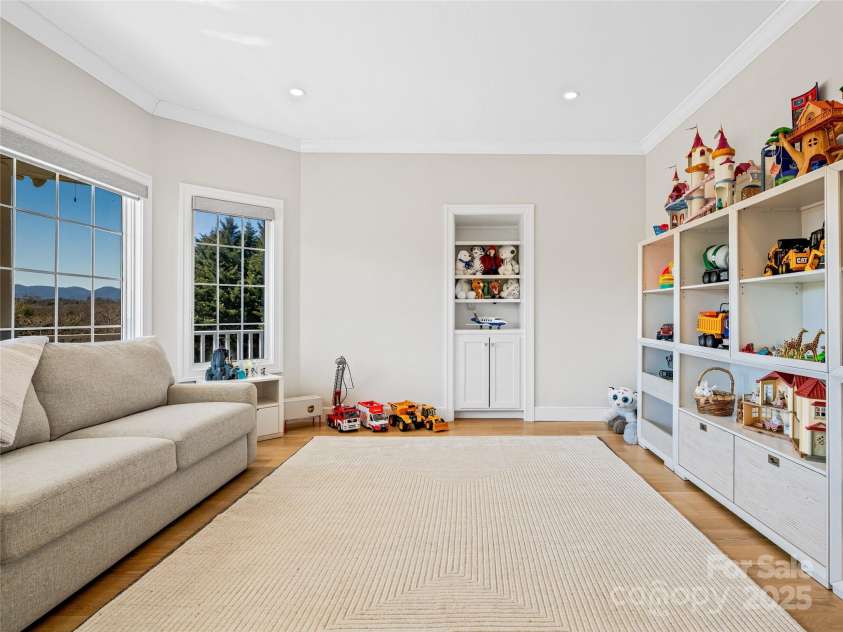 55 Plantation Drive, Asheville, NC 28806.  MLS# CAR4230730, YatesRealty ID 3745. Main Level Bonus Room. Space could make for a nice home office, sitting room or even additional space for guests.