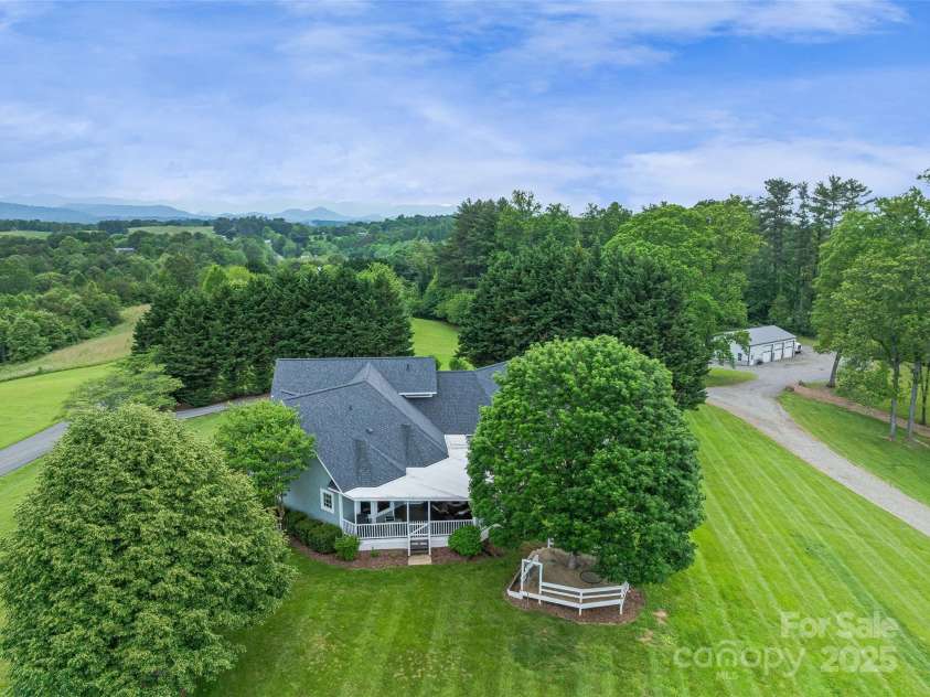 55 Plantation Drive, Asheville, NC 28806.  MLS# CAR4230730, YatesRealty ID 3745. Rear Aerial View #2 of Home - 3 Bay Metal Garage Building in background.