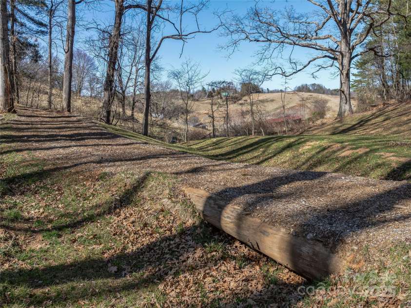 55 Plantation Drive, Asheville, NC 28806.  MLS# CAR4230730, YatesRealty ID 3745. View of interior trail system of property.